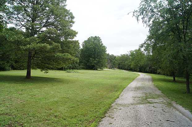 Long approach to house at Caro Drive