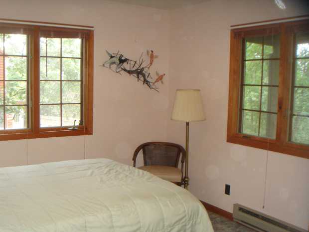 Cabin bedroom at Caro Drive