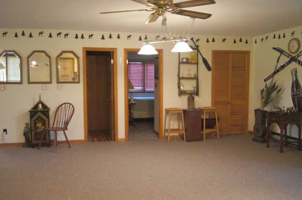 Wall with doors in cabin at Caro Drive