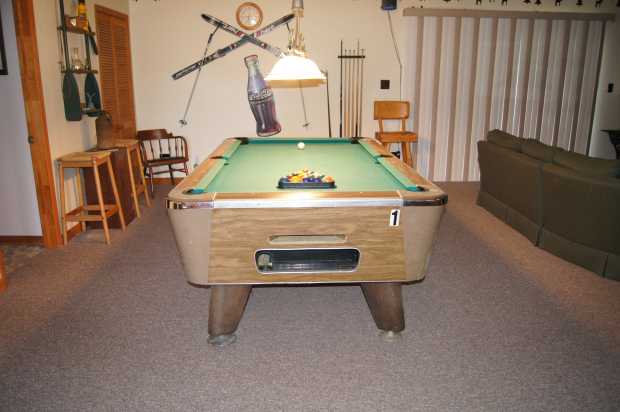 Pool table in cabin at Caro Drive